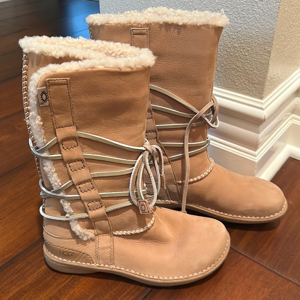 Leather Ugg lace up boots. Never worn. Size 8.